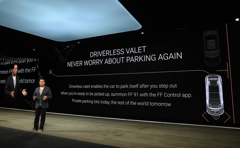 Hong Bae explains the valet parking feature at the FF 91's CES debut. Photo Credit: Getty Images